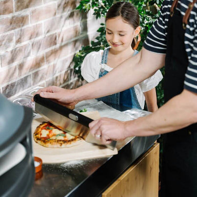 Everdure Pizza Cutter Rocker Cutting Pizza