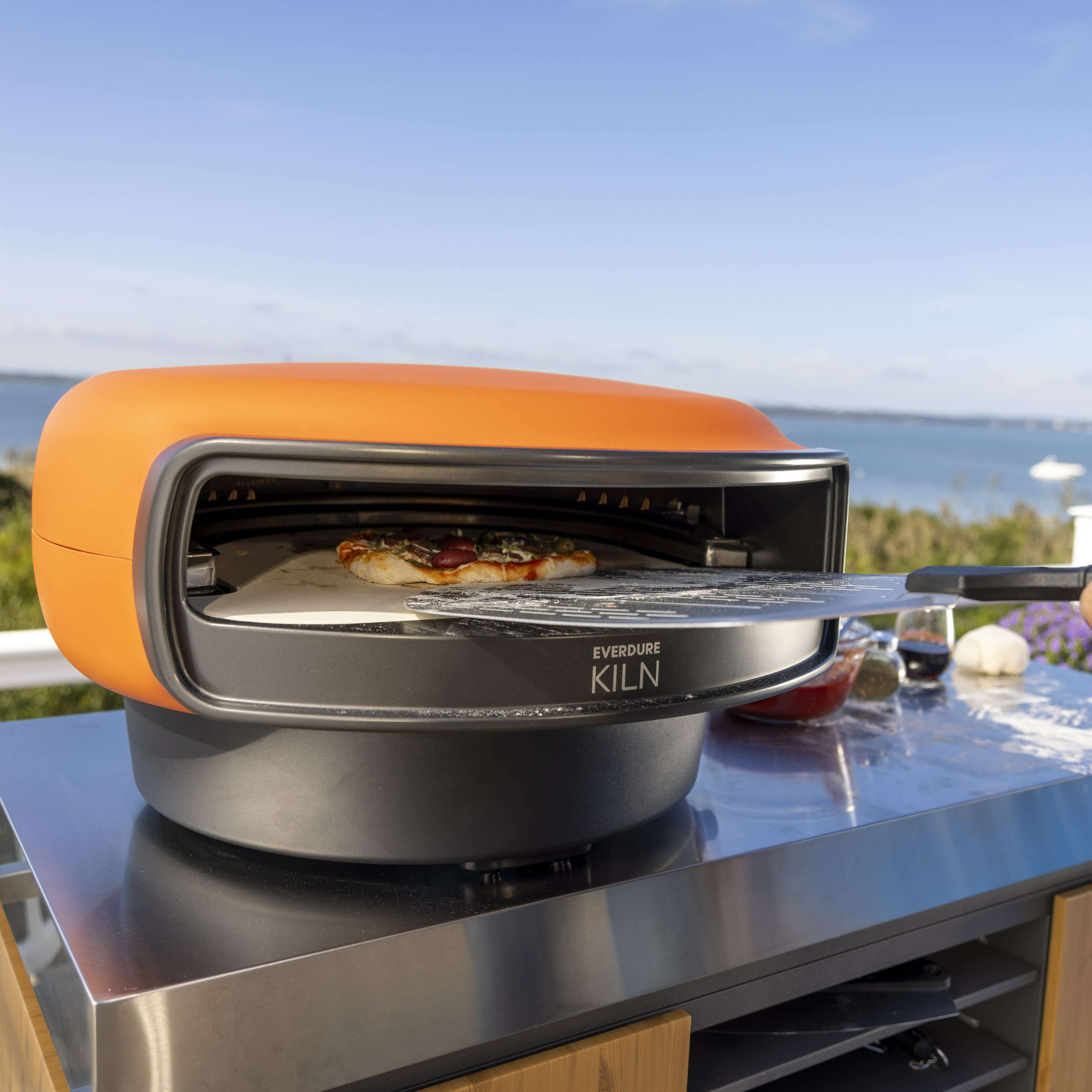 Evrdure Kiln S Platinum Bundle pizza cooking in oven on stand