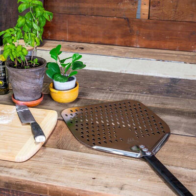 WPPO 12in Professional Pizza Peel on table