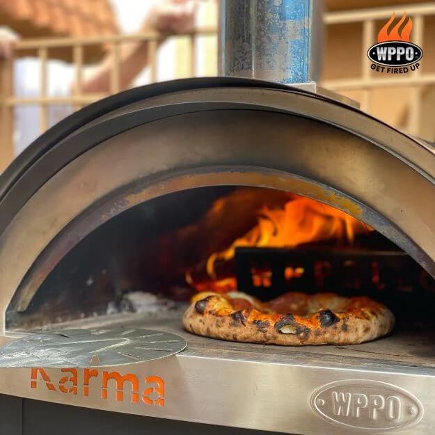 Pizza cooking in WPPO Karma 25 Wood Fired Pizza Oven