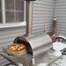 WPPO Lil Luigi Portable Pizza Oven outside with cooked pizza